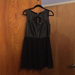 Black cocktail / club dress with cut-out in front
